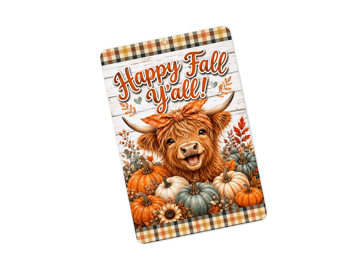 A rectangular decorative sign with rounded corners featuring a Highland cow surrounded by pumpkins and fall leaves, with the text 'Happy Fall Y'all!' on a white wood-plank background and an orange plaid border.