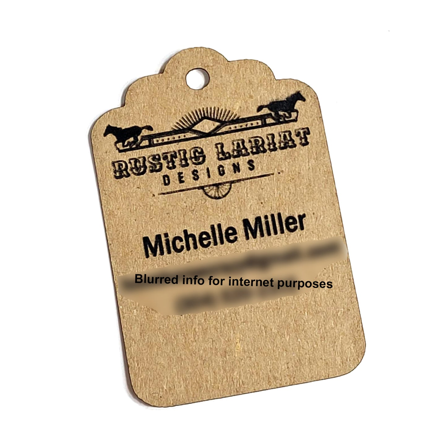Brown cardstock tag with 'Rustic Lariat Designs' and contact information for handmade products.