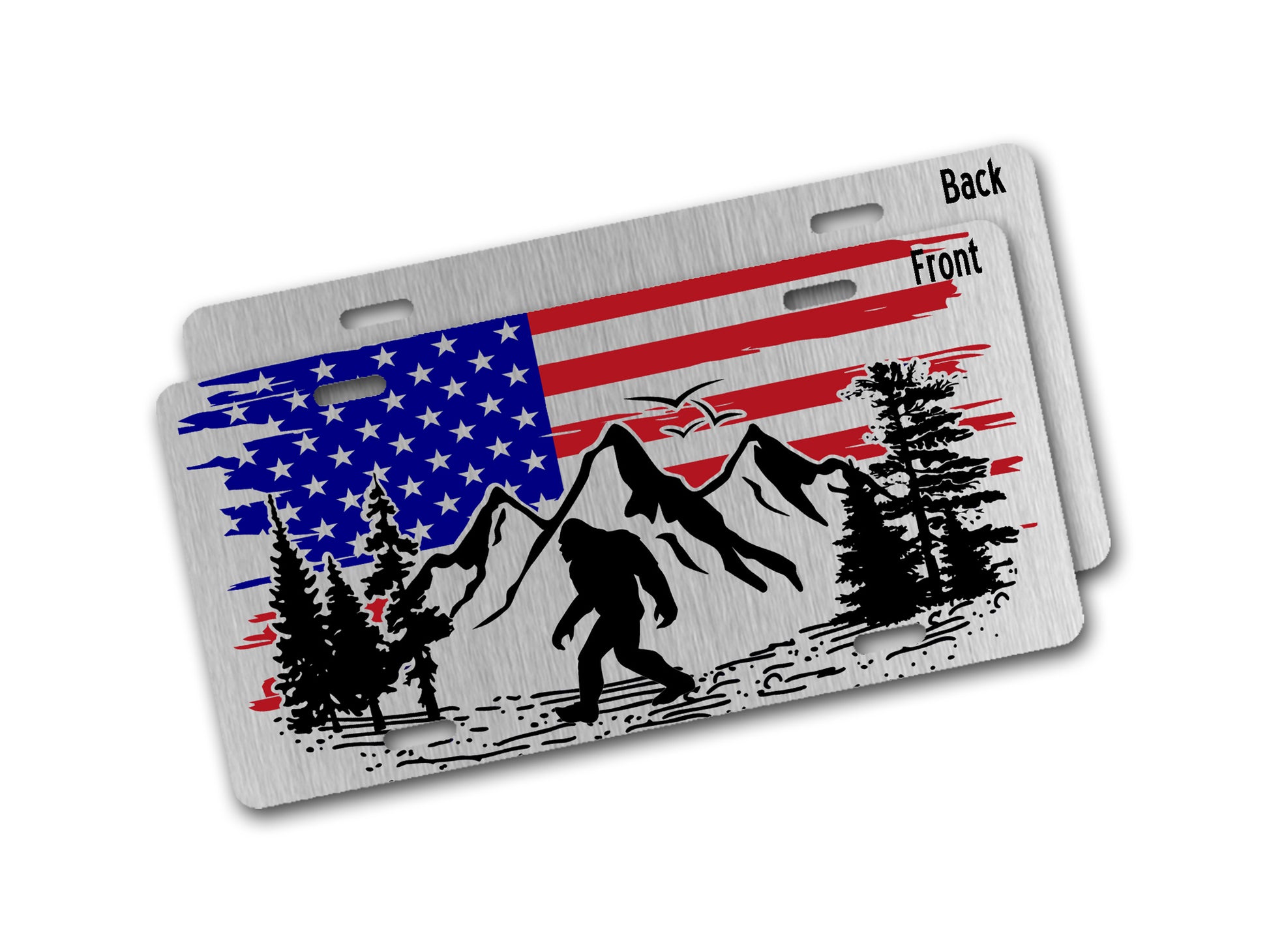 Aluminum license plate with American flag, mountains, and a Sasquatch design on a white background.