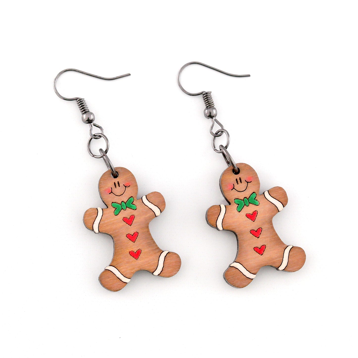 Gingerbread man earrings on a white background