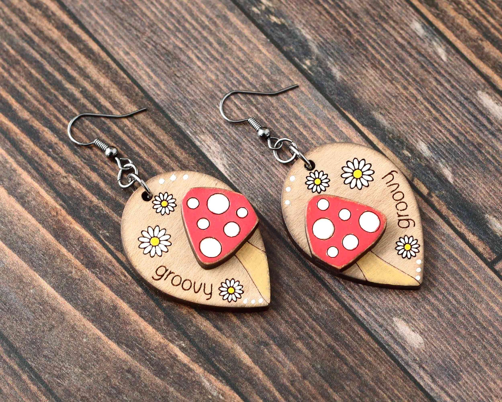 mushroom earrings close up