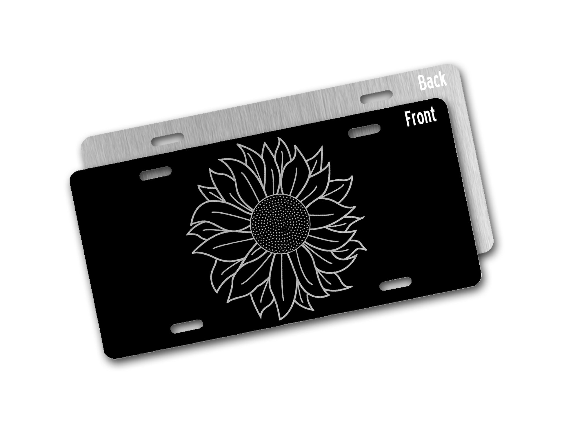 Black license plate with silver sunflower design on a white background